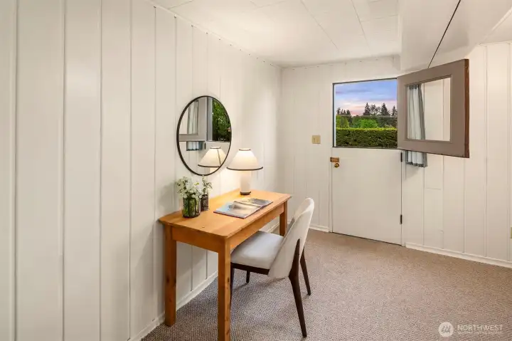 Spacious lower-level retreat area adaptable for office, hobbies or storage.