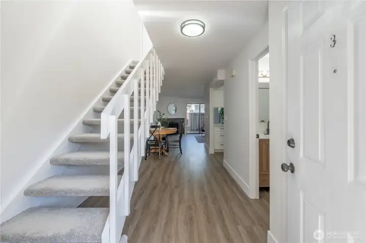 Welcome home to the new luxury vinyl plank flooring on the main level and plush new carpet on the stairs and upper floor.