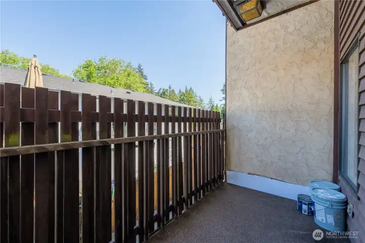 Spacious private patio with additional storage closet (not in photo).