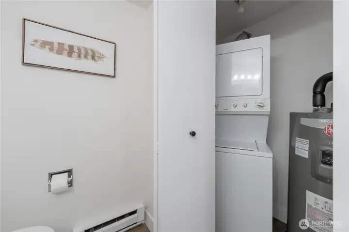 In-unit washer, dryer and water heater conveniently located in the laundry closet of the main floor bathroom.