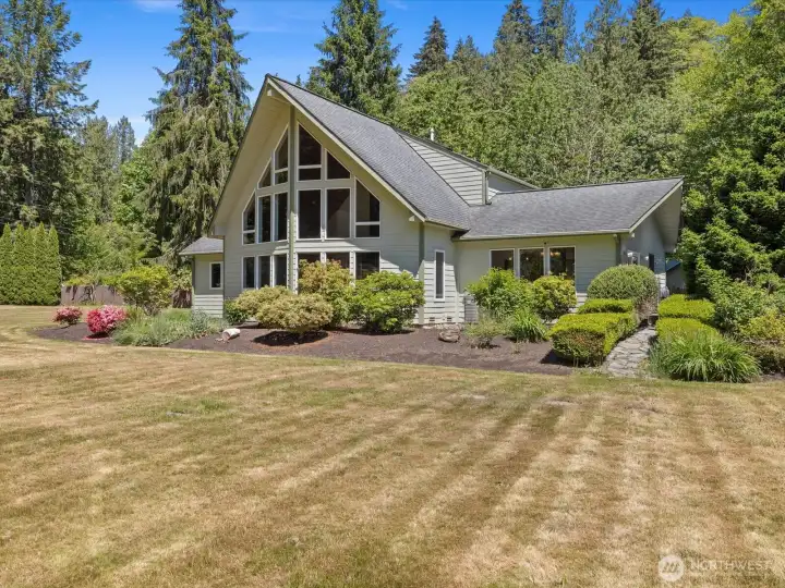 Welcome home! This house was thoughtfully designed and constructed to take full advantage of its 2.3 acre lot and riverfront.