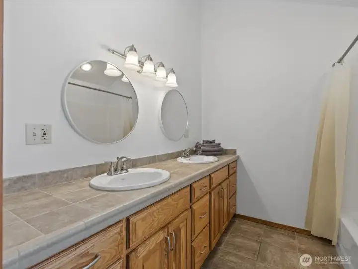 This full bath is also part of the upper level primary suite.
