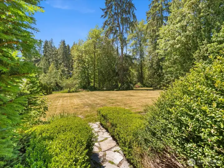 Flagstone walk-way to the expansive yard.