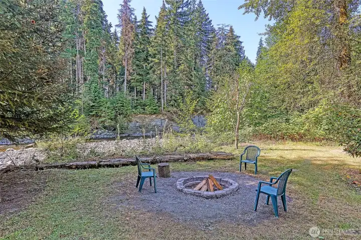 The firepit on the bank of your river frontage.