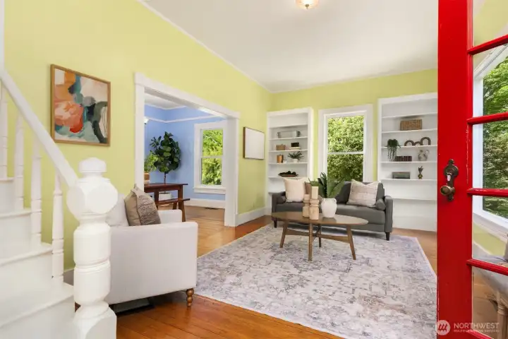 Step into timeless charm with vintage details featuring original hardwood floors, tall ceilings, decorative trim molding, and beautifully cased openings.