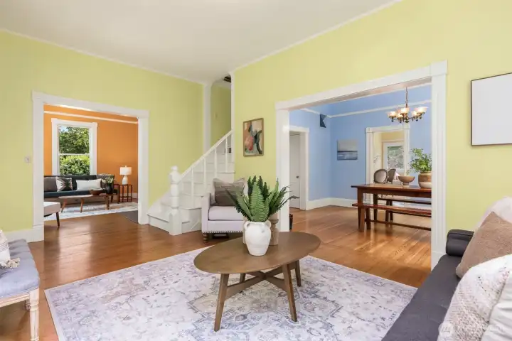 The living room is open to the den and dining room.
