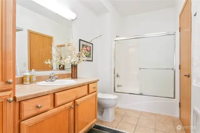 The first of two full bathrooms.