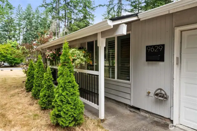 The covered porch adds nice protection from the elements & offers nice privacy