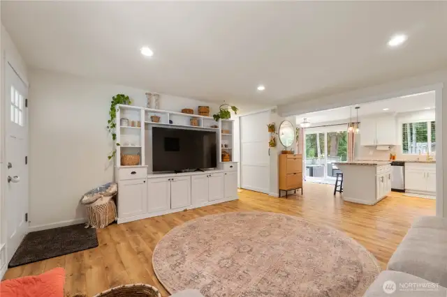 Gleaming laminate floors expand throughout the home