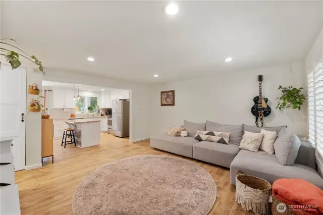 The great room is spacious and overlooks the gorgeous kitchen & dining areas
