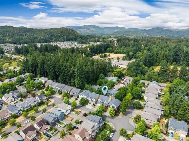 This aerial shot really captures the best of both worlds. Surrounded by lush mountainous forests, this West Olympia location is as tranquil as it is convenient.