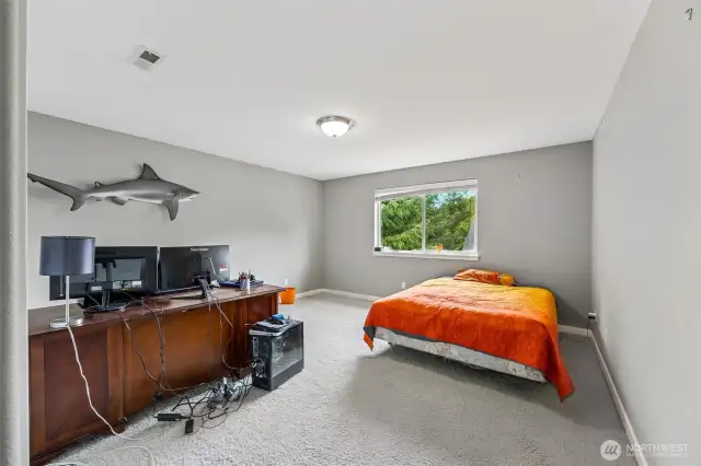 This bedroom is more like a junior suite with room to spare. A double-size closet gives you plenty of storage space, and the neutral carpeting and paint provide the perfect backdrop for your personal touch. The large window lets in plenty of light, and the wide slat blinds give you full control over how much you let in. Plus, with the heat register on the ceiling instead of the floor, you’ll have more options when it comes to arranging furniture. No more worrying about blocking the heat!