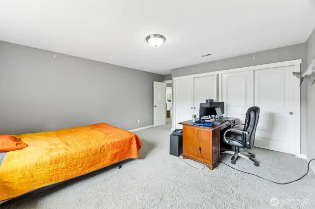 This second view of Bedroom 3 really shows off its versatility. With double closets and plenty of space, it’s ideal for a media room where you can kick back and watch your favorite shows. Or, if you’re looking for something more fun, this room could easily be transformed into a dorm-style bunkhouse with room for everyone. The size and layout offer endless possibilities for however you want to use it.