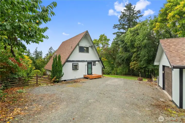 A-Frame retreat tucked away on 1.75 acres!
