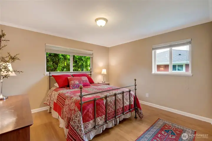 One of 3 main floor bedrooms.