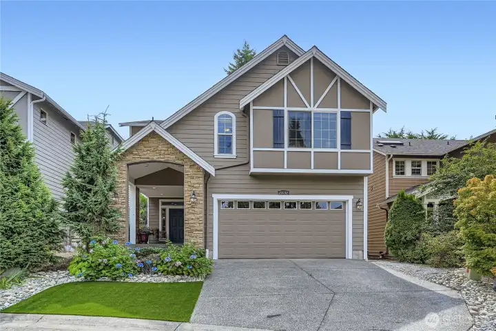 Street appeal is abundant here with professional landscaping, cement board siding, stone accents, and high quality turf to set it off!