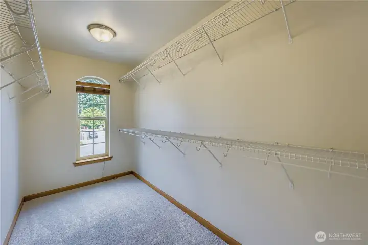 Walk-in closet and a second closet just across the hall with storage for clothes and more!