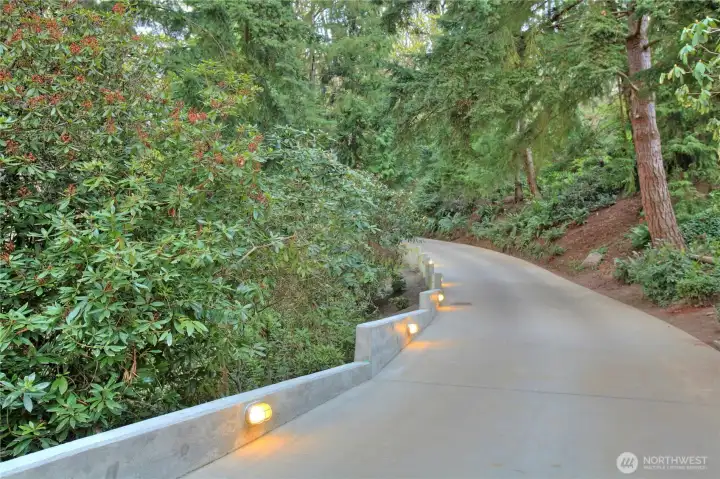 Long gated and lighted private driveway