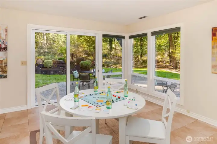 Downstairs rec room w/ door to backyard & patio