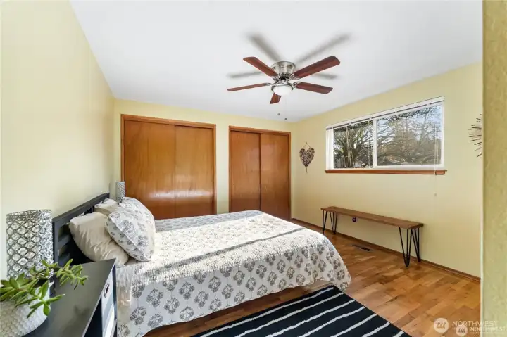 Primary bedroom on east side of home