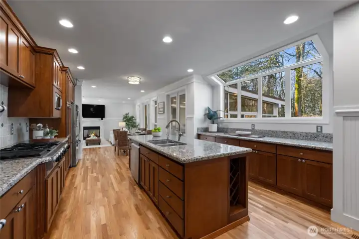 Chef's kitchen has such a great layout and incredible storage space! Notice all of the counter space!