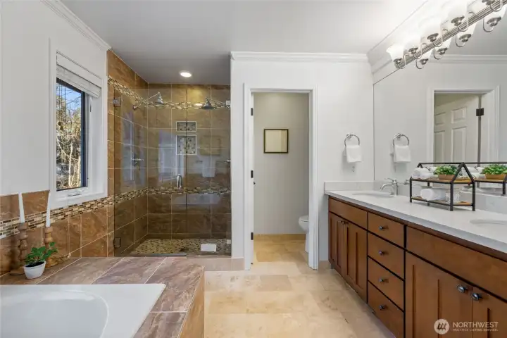 The 5 piece primary ensuite is timeless...