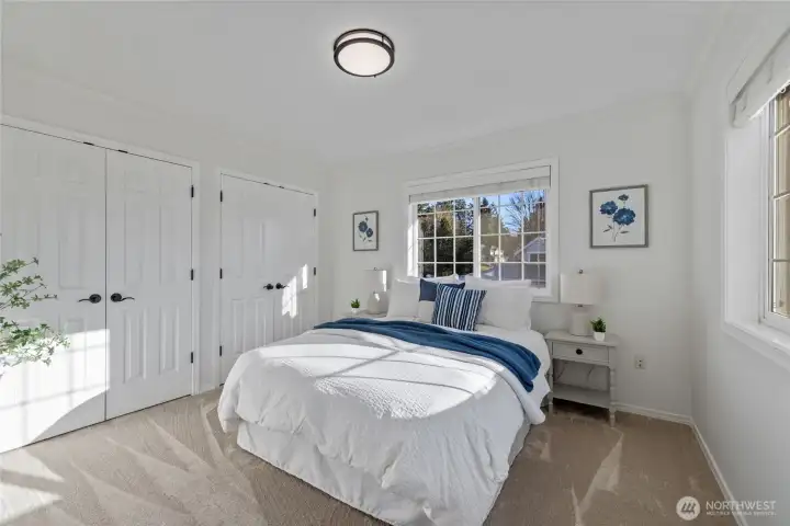 This bedroom is just beautiful. Natural light and ample closet space make this a very desirable space.