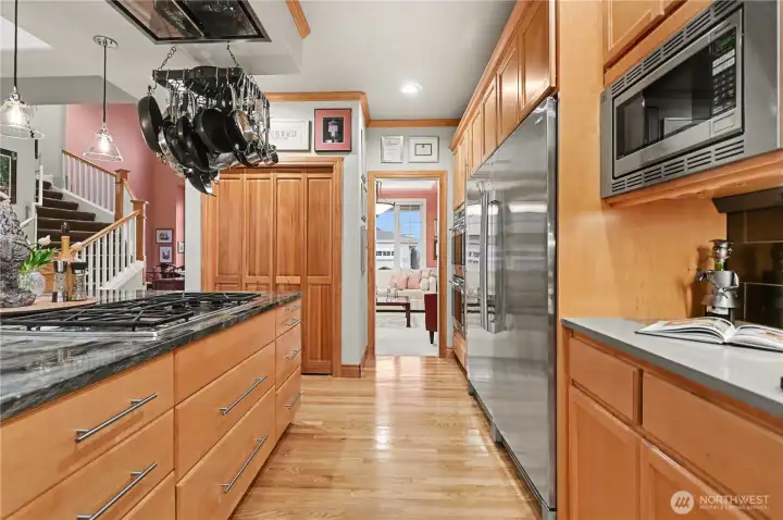 Another view of this stunning kitchen showcasing it's central location within the home.