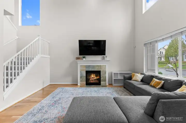 Cozy fireplace runs on natural gas.