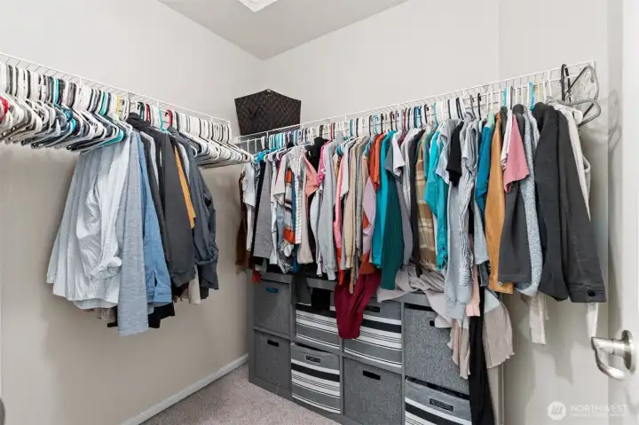 Spacious primary closet.