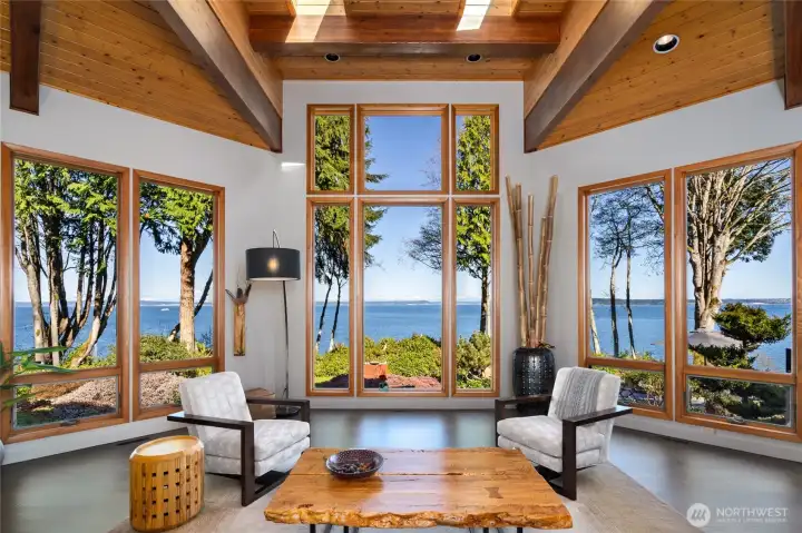 Living room with vaulted ceilings and ocean views