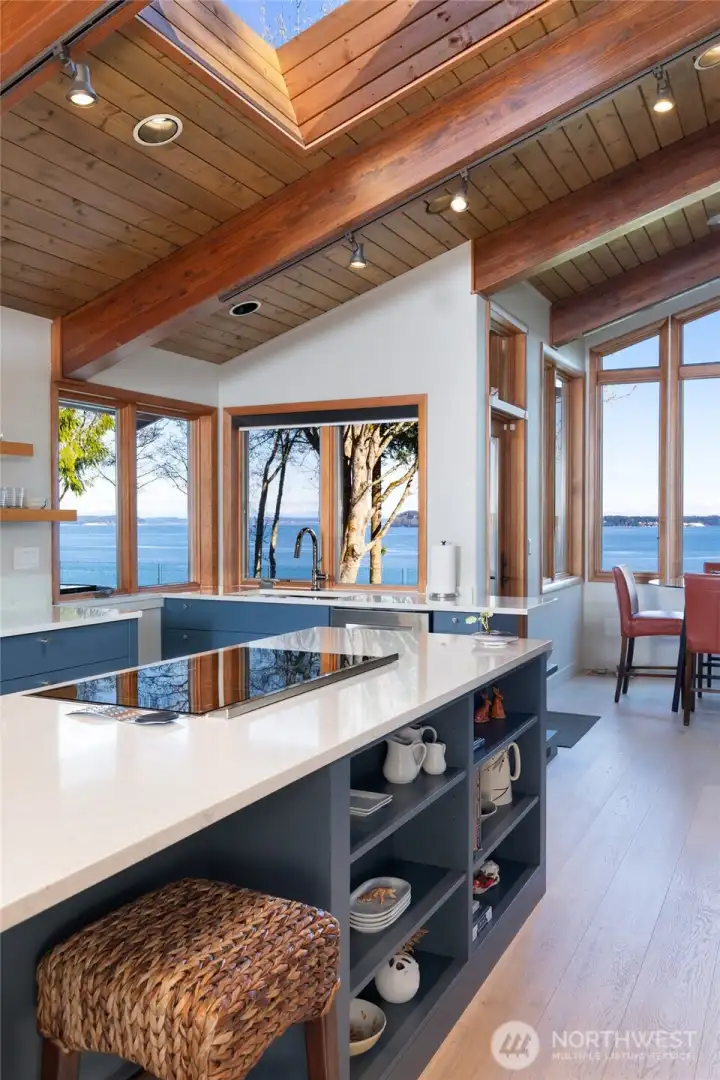 Open kitchen with island and ocean views