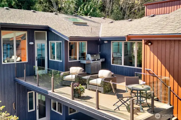 Private deck with seating and outdoor dining area