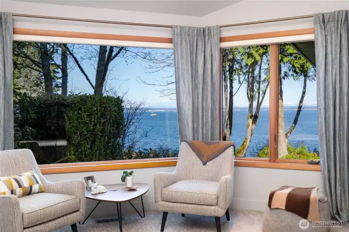 Abundant Natural Light and beautiful views in this sitting area.