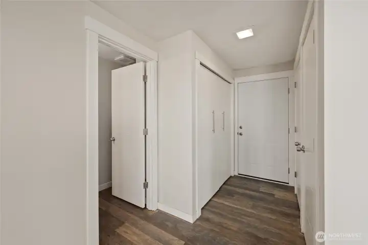 Upstairs hall to a half bath, utilities and backdoor to your backyard, detached garage.