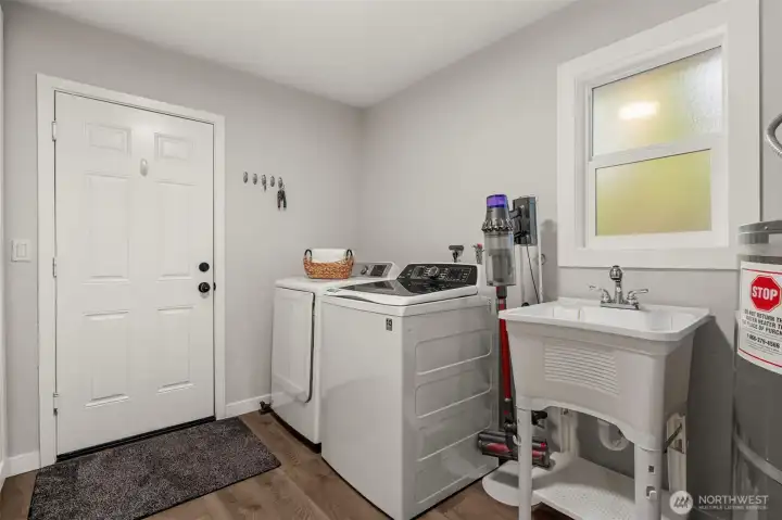 laundry room with extra storage
