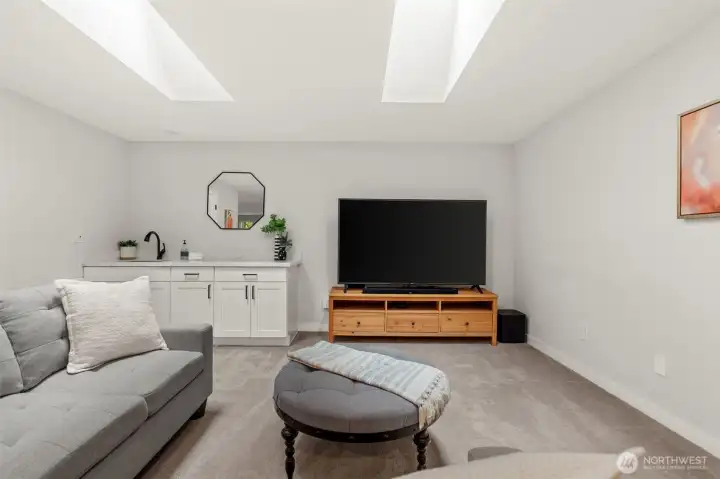 loft space with skylights for natural light