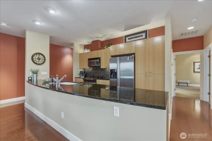 Granite counters, kitchen island w/ sink
