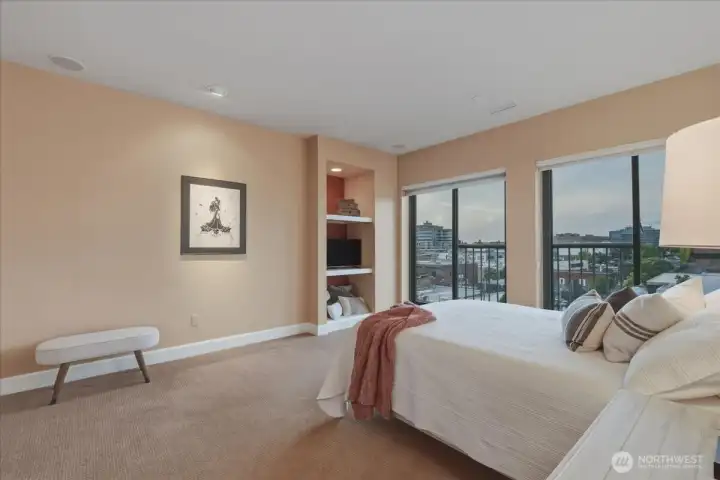 Primary suite, built-in shelves, ensuite bath, double vanity, walk-in tile shower, walk-in closet