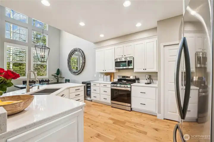 Newer gas cooktop/oven & microwave. Updated hardware to complete this look. Newer gas cooktop/oven & microwave. Updated hardware to complete this look.