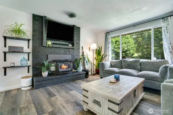 A pellet stove provides warmth during the colder months, while the heat pump helps keep the home comfortable throughout the year.