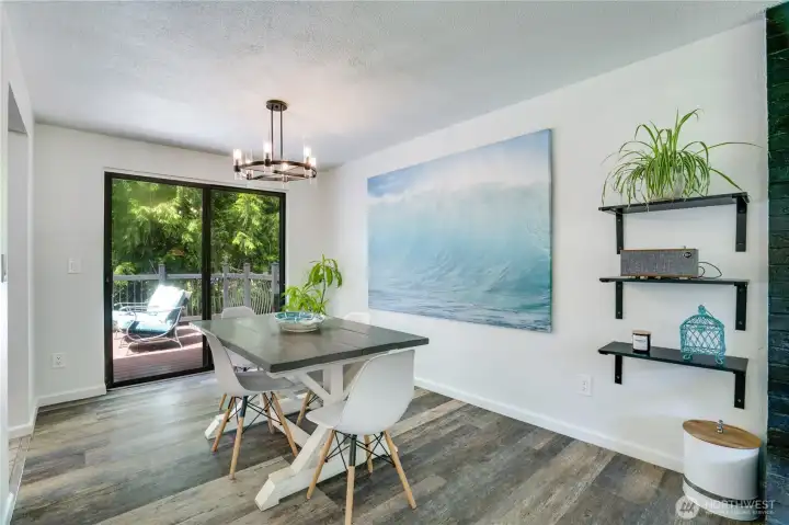 Natural light and an easy connection to the kitchen and living room make this dining space well suited for everyday meals and gatherings.