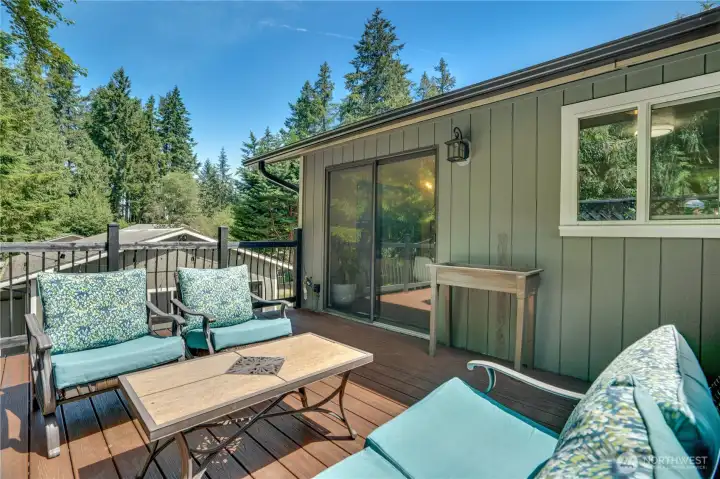 Off the dining space, enjoy this private patio—an ideal spot for morning tea or an evening visit with friends.