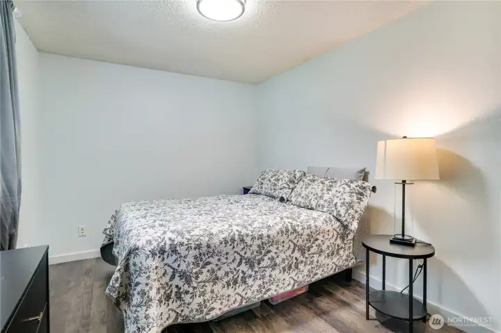 Bedroom 2 upstairs is generous in size and faces the front of the home for afternoon sunshine.