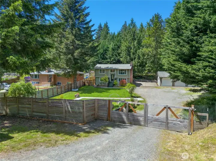 Enjoy the best of both worlds—a peaceful, fenced setting with plenty of outdoor space, all while staying close to Bonney Lake's shopping, dining, and everyday conveniences.