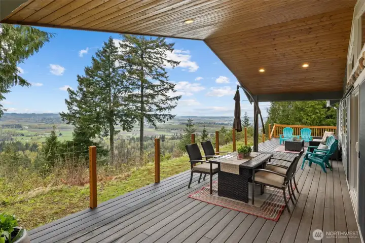 Covered deck allows for year round enjoyment of the Snoqualmie River Valley. Covered deck allows for year round enjoyment of the Snoqualmie River Valley.
