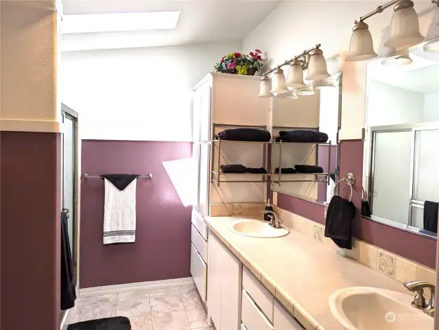 Nice double vanity, shower with seat.