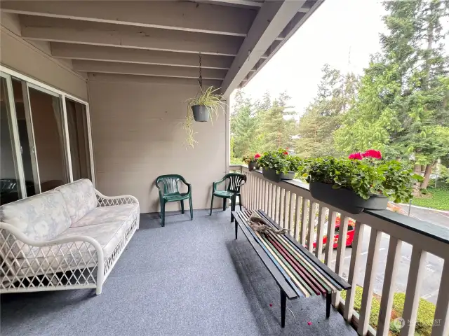 Wonderful private balcony overlooks the trees.