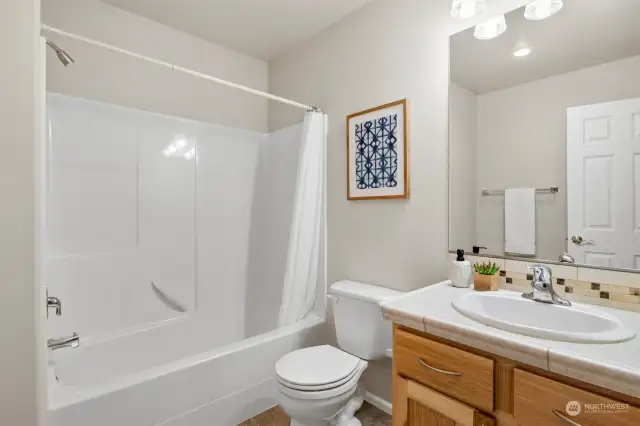 Full bathroom on garage-entry level.