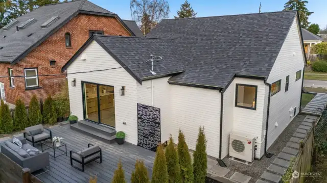 Backyard deck with privacy hedges